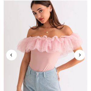 Pink ruffle off the shoulder thong body suit